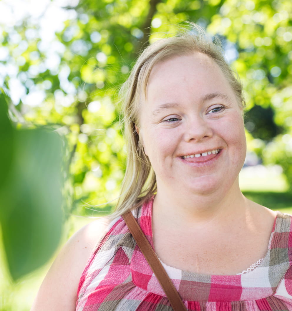 Woman with down syndrome smiling